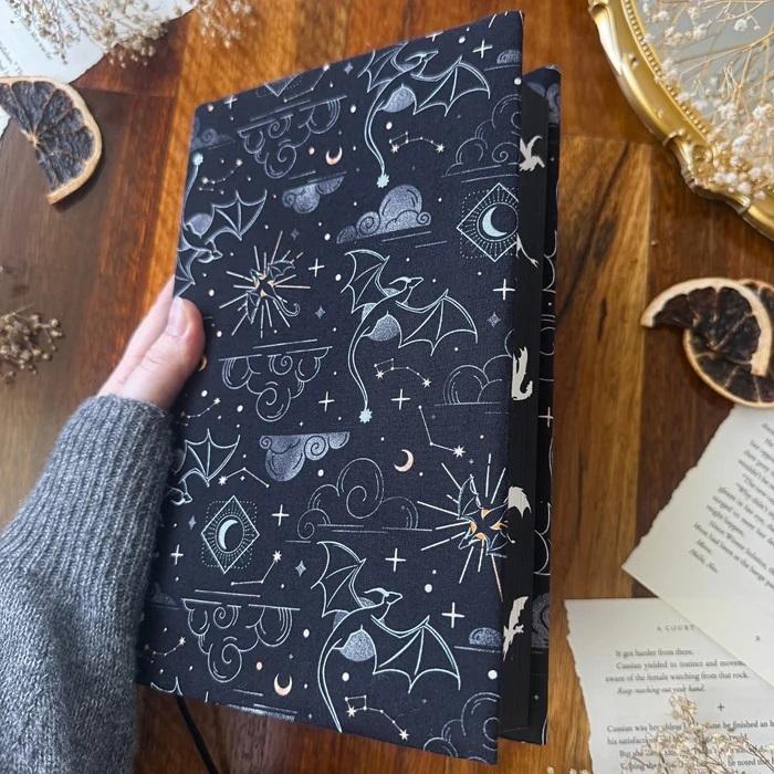 Onyx Storm Large Dust Jacket (Empyrean)  by Charlie and Fox at Abbey's Bookshop, 