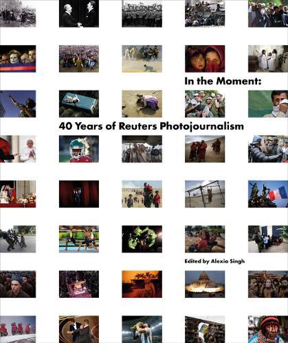 In the Moment: 40 Years of Reuters Photojournalism  by Reuters at Abbey's Bookshop, 